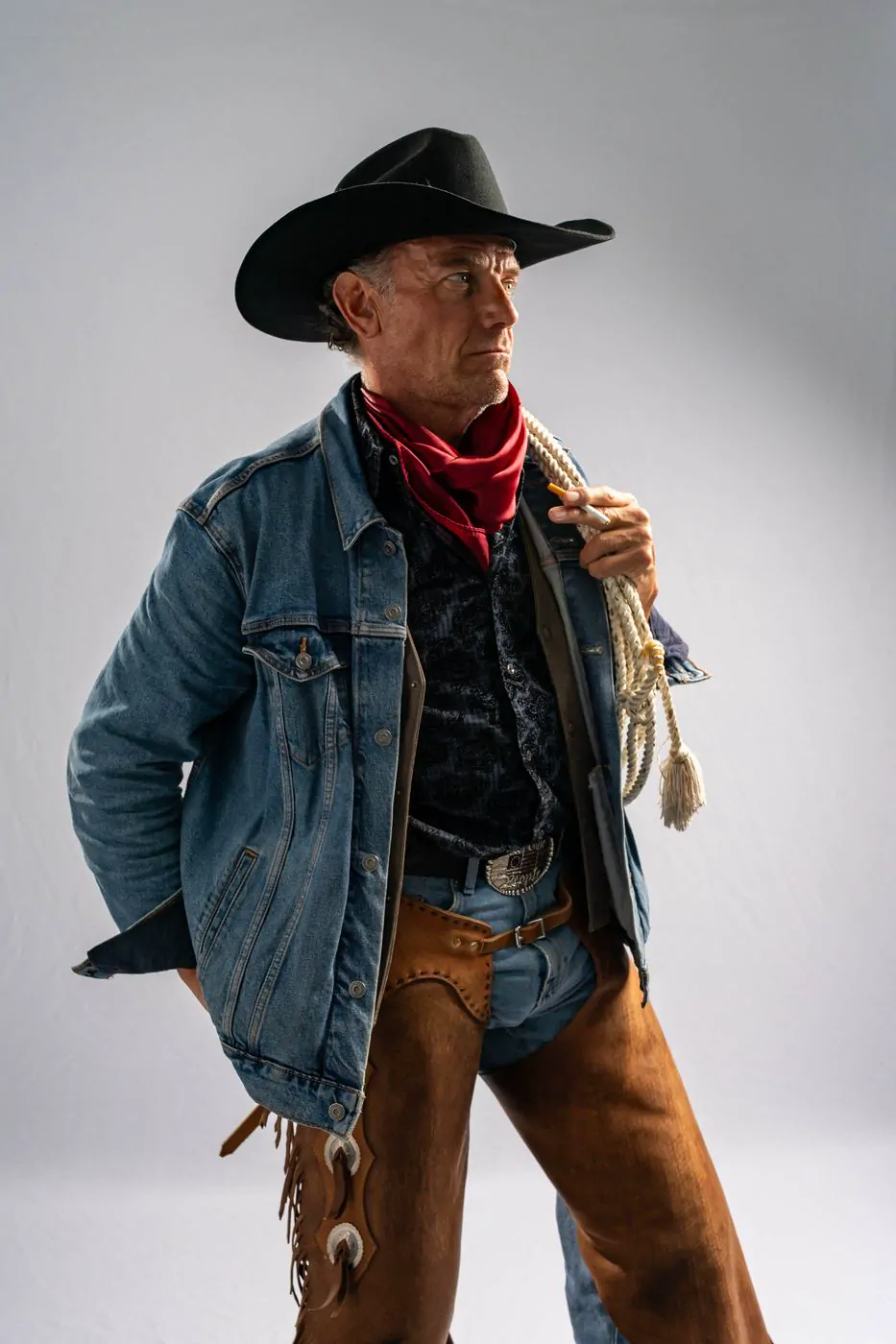Cowboy portrait with rope and cigarette