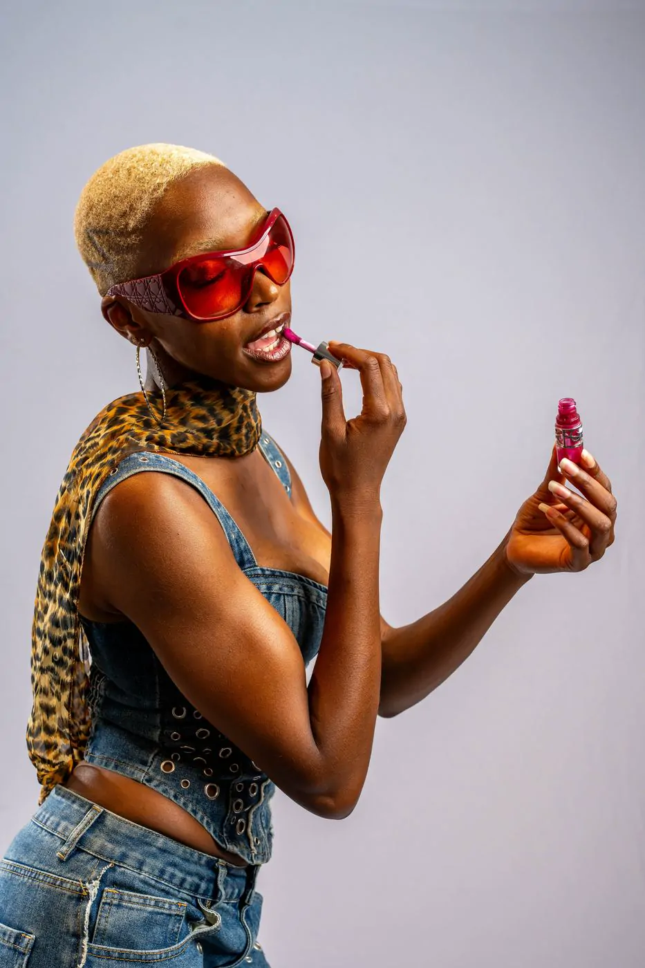 Fashion beauty portrait with red sunglasses and lipstick